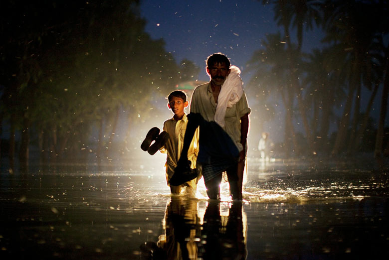 Pakistan flood refugees, man & boy